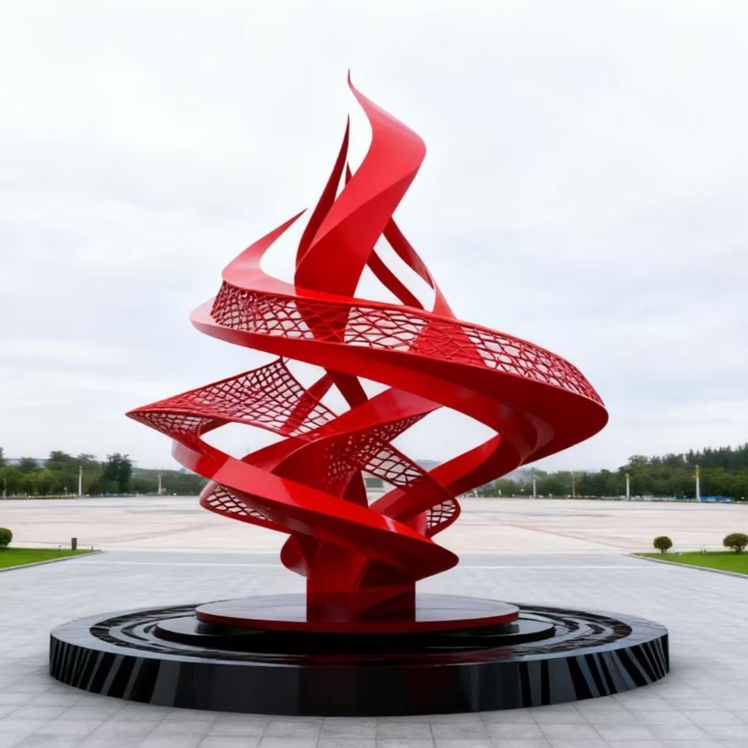 Large red abstract sculpture for an outdoor public art project