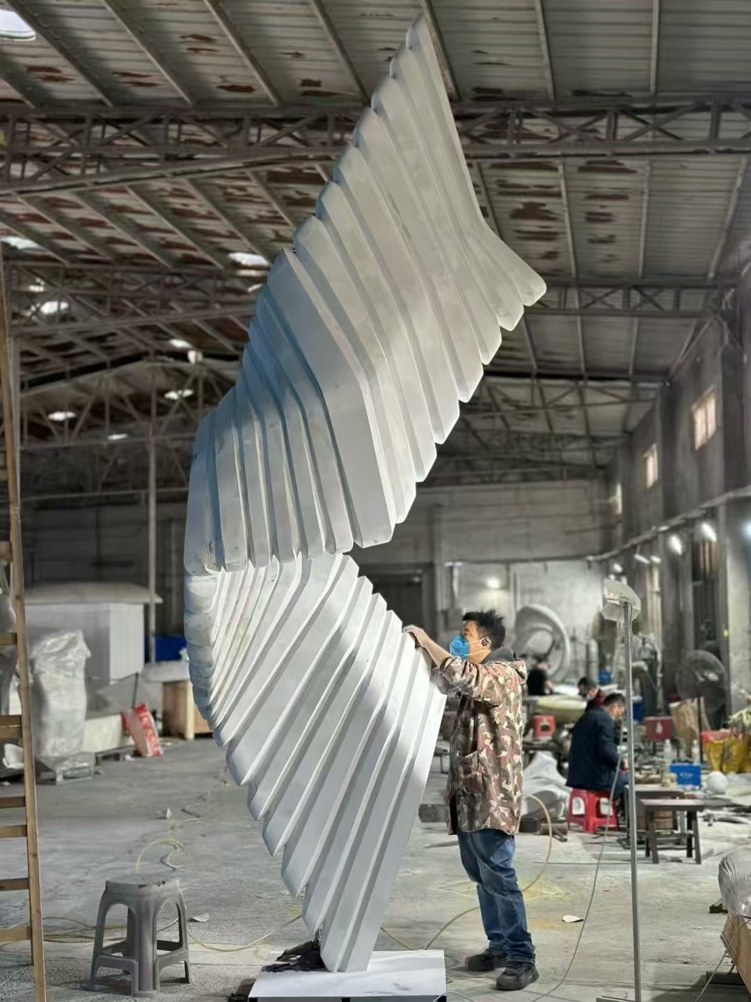 Large custom sculpture being checked in the fabrication workshop