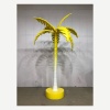 Completed yellow artificial palm tree display prop in the workshop