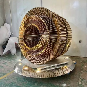 Second workshop view of the same completed layered ring sculpture
