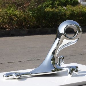 Completed chrome-finish organic display sculpture front three-quarter view
