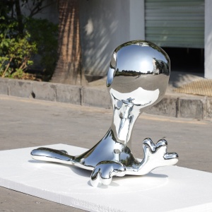 Side view of the same completed chrome-finish commercial sculpture