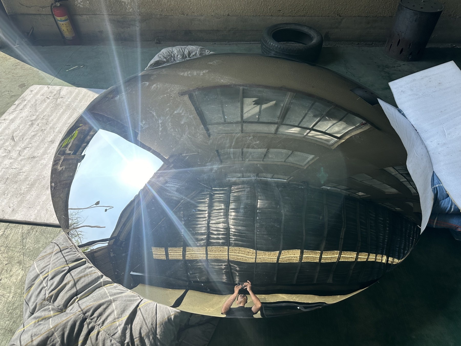 Second finished-surface view of the same convex mirror stainless steel disc
