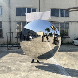 Finished convex mirror stainless steel sculpture front view