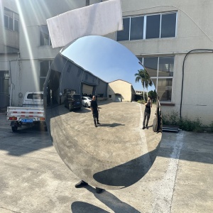 Finished convex mirror sculpture reflection from another viewing angle