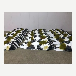 Completed modular faux rock and moss display prop set