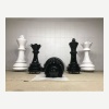 Coordinated giant black and white chess piece display props