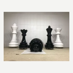 Coordinated giant black and white chess piece display props