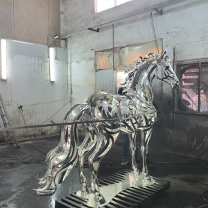Pre-finish stainless steel inspection for the same openwork horse design