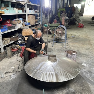 Workshop polishing review for the same stainless steel disc sculpture