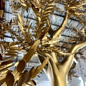 Second leaf and branch finish detail on the same golden tree sculpture