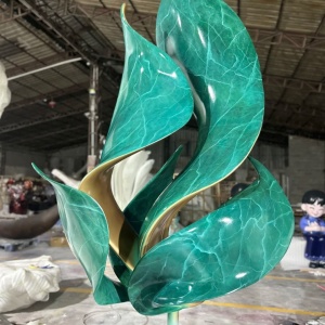 Front workshop completion view of the same green patina leaf sculpture