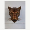 Front view of a custom leopard head wall sculpture