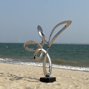 Second angle of the same flowing loop stainless steel sculpture