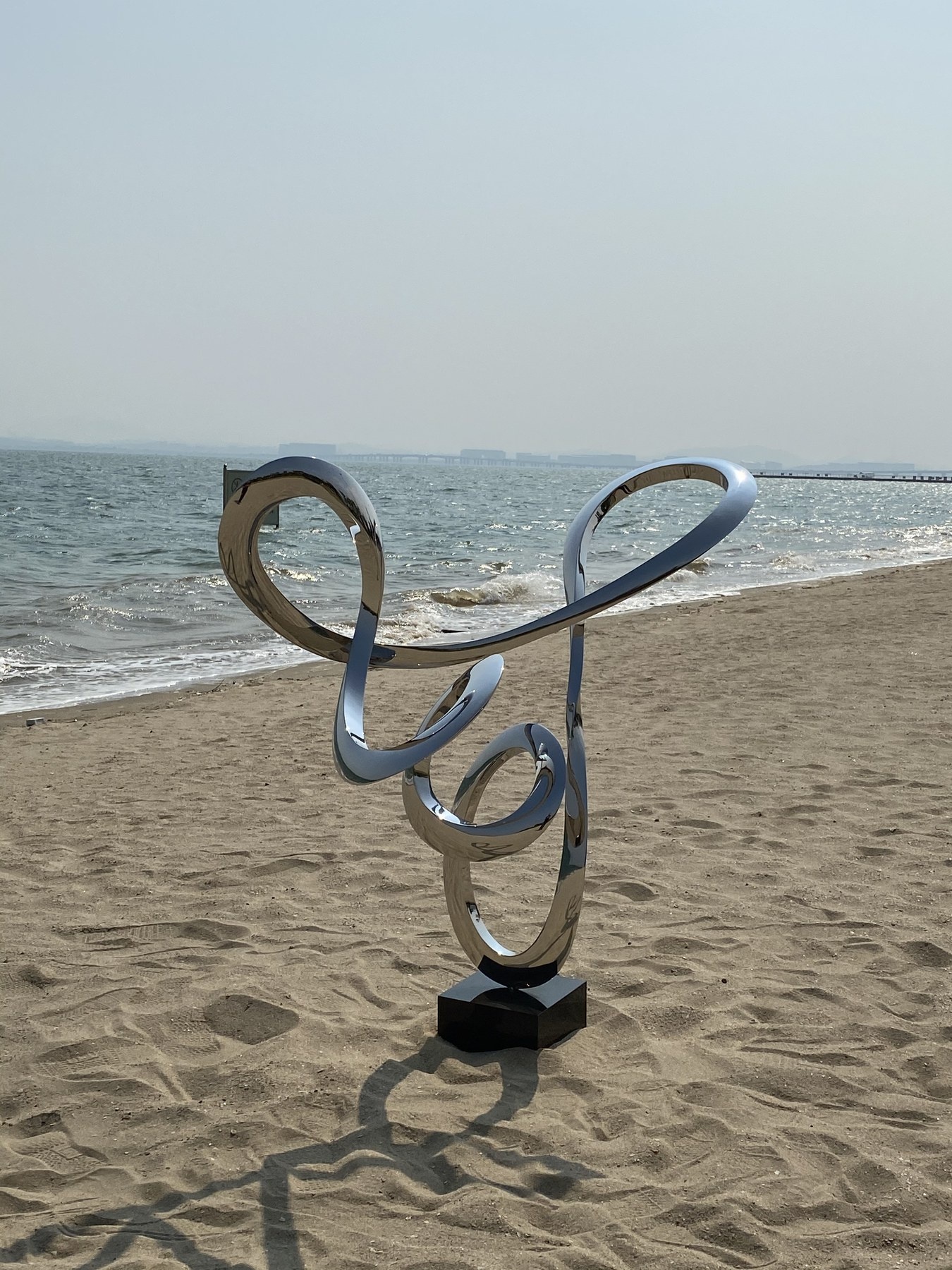 Outdoor context for the same custom loop sculpture