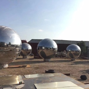 Multiple mirror stainless steel spheres from the same outdoor project
