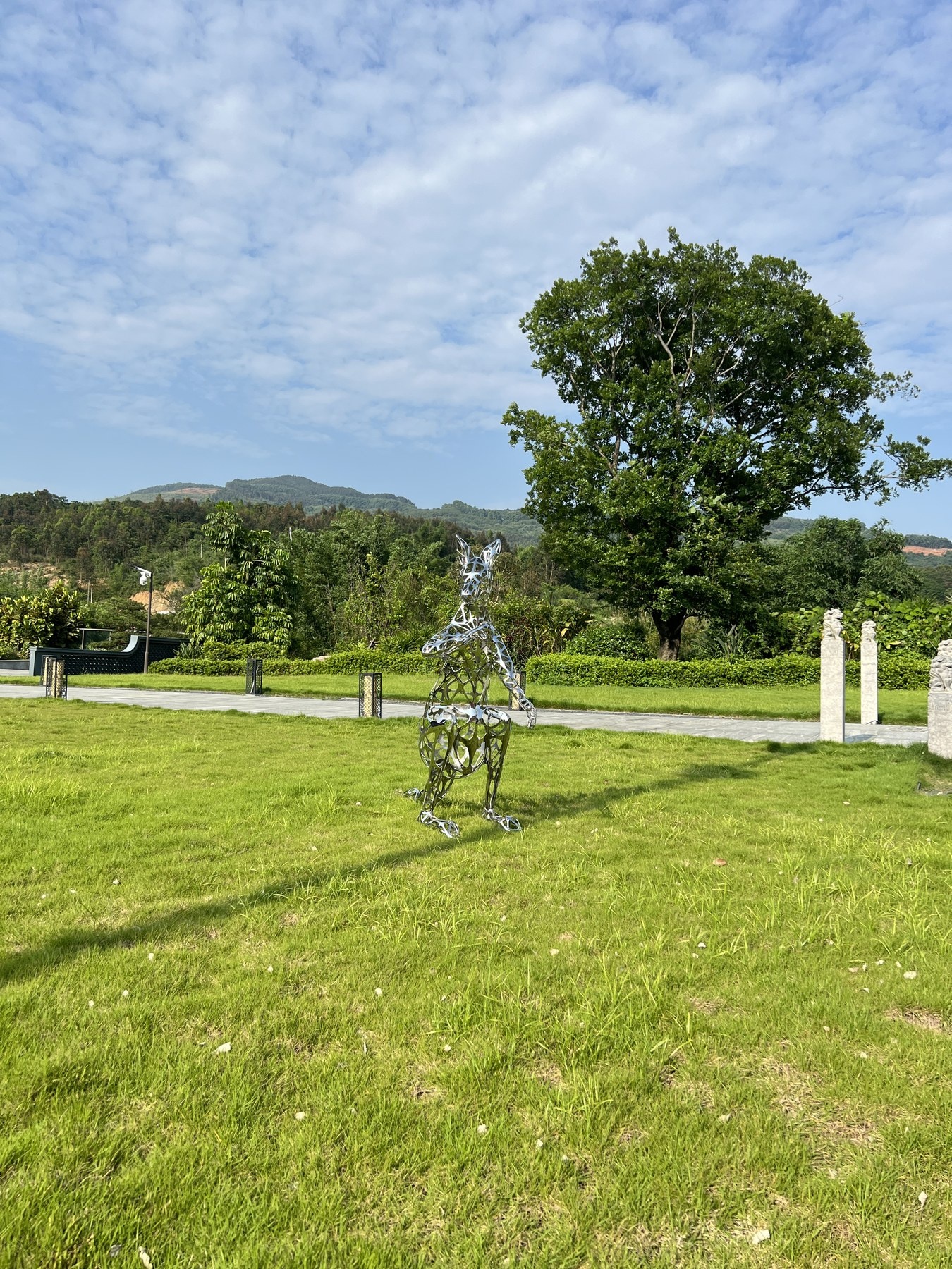 Landscape context for the same openwork kangaroo sculpture