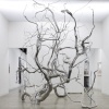 Completed stainless steel branch sculpture in an interior art installation