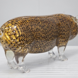 Full view of the same transparent openwork pig sculpture